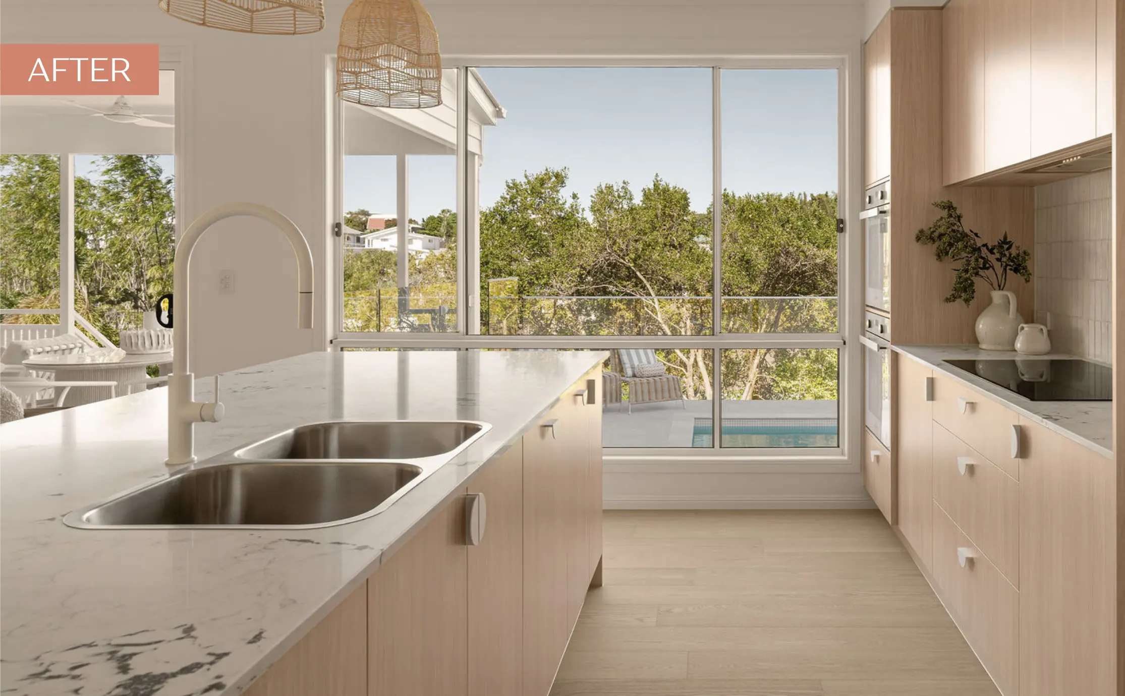 The same kitchen after its benchtop was replaced with new stone by Kitchen and Home Renovations Co.